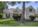 Charming home with mature trees, manicured lawn and window shutters at 5011 W Liberty Meadows Dr, Summerville, SC 29485