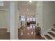 Open floor plan and gleaming hardwood floors create a warm, inviting ambiance at 5011 W Liberty Meadows Dr, Summerville, SC 29485