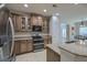Well-appointed kitchen with granite countertops, stainless steel appliances, and ample cabinetry at 5011 W Liberty Meadows Dr, Summerville, SC 29485