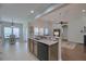 Open-concept kitchen featuring granite countertops and seamless connectivity to the living and dining areas at 5011 W Liberty Meadows Dr, Summerville, SC 29485