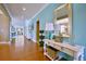 Bright hallway featuring hardwood floors and stylish console table at 507 Cropfield Dr, Summerville, SC 29485