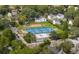 Aerial view of a neighborhood featuring a playground and basketball court nestled among tree-lined streets and charming homes at 509 Klein St, Mount Pleasant, SC 29464