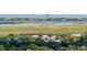 Elevated view of a marsh with distant town and bodies of water at 509 Klein St, Mount Pleasant, SC 29464
