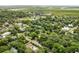 Aerial view of a house in a tree-lined neighborhood, near Mount Pleasant Academy at 509 Klein St, Mount Pleasant, SC 29464