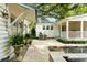 Picturesque backyard featuring a pool, outdoor kitchen area, and lush greenery perfect for entertaining at 509 Klein St, Mount Pleasant, SC 29464
