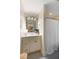 Well-lit bathroom with modern fixtures, a stylish vanity, and a shower, offering a clean and functional space at 509 Klein St, Mount Pleasant, SC 29464