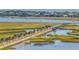 Scenic bridge lined with palm trees stretching across the marshland, connecting the community at 509 Klein St, Mount Pleasant, SC 29464