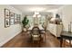 Bright dining room with stylish lighting fixture, hardwood floors, and space for a large dining table at 509 Klein St, Mount Pleasant, SC 29464