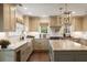 Gourmet kitchen with marble countertops, custom cabinets, and stainless steel appliances at 509 Klein St, Mount Pleasant, SC 29464