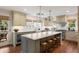 Gourmet kitchen with a large island, marble countertops, custom cabinets, and stainless steel appliances at 509 Klein St, Mount Pleasant, SC 29464
