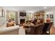 Cozy living room featuring a brick fireplace, built-in bookcase, and comfortable seating arrangement at 509 Klein St, Mount Pleasant, SC 29464