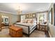 Bright main bedroom with a luxurious bed, stylish decor, and large windows offering natural light at 509 Klein St, Mount Pleasant, SC 29464