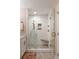 Modern shower featuring subway tile, glass door, and bronze fixtures at 509 Klein St, Mount Pleasant, SC 29464