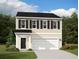 Charming two-story home with classic design elements, a garage, and a well-maintained front lawn at 5302 Bending Flats Way, Summerville, SC 29485