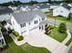 Aerial view of a charming two-story home with a manicured lawn and inviting curb appeal at 558 Pendleton Dr, Moncks Corner, SC 29461