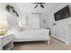 Comfortable bedroom features neutral carpet, queen bed, and white furniture accents at 558 Pendleton Dr, Moncks Corner, SC 29461