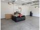 Spacious garage featuring a CNC machine, workbench, and ample room for projects and storage at 558 Pendleton Dr, Moncks Corner, SC 29461