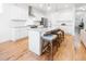 Contemporary kitchen with an island, breakfast bar, granite countertops and stainless appliances at 558 Pendleton Dr, Moncks Corner, SC 29461