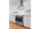 Modern kitchen features stainless steel appliances, gas range, white cabinets and granite countertops at 558 Pendleton Dr, Moncks Corner, SC 29461