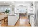 Open-concept kitchen with a large island, stainless steel appliances, and views of the living and dining areas at 558 Pendleton Dr, Moncks Corner, SC 29461
