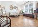 Bright living room showcasing hardwood floors and a cozy seating area with natural light at 558 Pendleton Dr, Moncks Corner, SC 29461