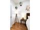 Bedroom features include lamps, hardwood floors, side table, and wall art at 558 Pendleton Dr, Moncks Corner, SC 29461