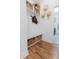 Mud room with custom storage including baskets, seating, and a view into the laundry area at 558 Pendleton Dr, Moncks Corner, SC 29461