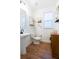 Contemporary powder room with modern fixtures, floating shelves, and stylish decor at 558 Pendleton Dr, Moncks Corner, SC 29461