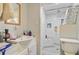 This bathroom is modern and features a glass shower and a large sink at 7074 W Constellation Dr, North Charleston, SC 29418