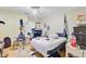 A bedroom with fair lighting, a ceiling fan and access to an exterior window at 7074 W Constellation Dr, North Charleston, SC 29418
