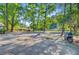 Spacious property with mature trees, offering a serene and private setting at 7074 W Constellation Dr, North Charleston, SC 29418