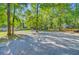 Spacious property with mature trees, offering a serene and private setting at 7074 W Constellation Dr, North Charleston, SC 29418