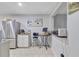 Open-concept kitchen with modern appliances and a cozy breakfast bar for casual dining at 7074 W Constellation Dr, North Charleston, SC 29418