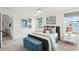 Bright bedroom with natural light, plush carpet, and a stylish bed with decorative pillows at 725 Maynard Ln, Summerville, SC 29486
