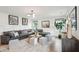 Spacious living area with comfortable seating, stylish decor, and ample natural light at 725 Maynard Ln, Summerville, SC 29486