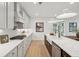 Well-equipped kitchen with white cabinets, modern appliances, and a light-filled space at 729 Maynard Ln, Summerville, SC 29486