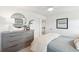 Bright bedroom with modern furnishings, natural light, and decorative mirror at 762 Maynard Ln, Summerville, SC 29486