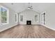 Bright open living room with fireplace, ceiling fan, and access to the backyard at 764 Maynard Ln, Summerville, SC 29486