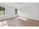 Bright bedroom with hardwood floors, with windows providing natural light and outside view at 770 Maynard Ln, Summerville, SC 29486