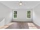 Bright bedroom with hardwood floors, with windows providing natural light and outside view at 770 Maynard Ln, Summerville, SC 29486