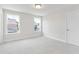Cozy bedroom featuring carpet flooring and two bright windows for lots of natural light at 770 Maynard Ln, Summerville, SC 29486