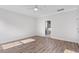 Spacious bedroom with access to the bathroom, hardwood floors, and plenty of natural light at 770 Maynard Ln, Summerville, SC 29486