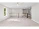 Bright bonus room with carpet flooring, ceiling fan, and stair access to additional rooms at 770 Maynard Ln, Summerville, SC 29486
