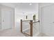 Welcoming upstairs hallway with views into open, brightly lit living space and bedrooms at 770 Maynard Ln, Summerville, SC 29486