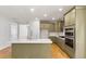 Well-equipped kitchen featuring a large island, stainless steel appliances, and modern finishes at 770 Maynard Ln, Summerville, SC 29486