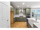 Beautiful kitchen with stainless steel appliances, a farmhouse sink, and ample counter space at 770 Maynard Ln, Summerville, SC 29486