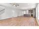 Spacious open-concept living room featuring hardwood floors, and a view of the kitchen at 770 Maynard Ln, Summerville, SC 29486