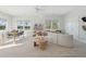 Bright living room features a neutral palette, modern furnishings, and abundant natural light from multiple windows at 772 Maynard Ln, Summerville, SC 29486