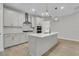 Bright kitchen featuring white cabinets, an island with a sink, and stainless steel appliances at 773 Maynard Ln, Summerville, SC 29486