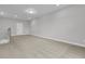Bright, spacious loft with neutral carpet and trim, featuring a closet door and ample lighting at 773 Maynard Ln, Summerville, SC 29486